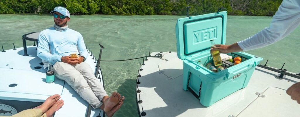 https://huntingwaterfalls.com/wp-content/uploads/2019/11/yeti-tundra-45-seafoam-green-boating-relaxing-1024x400.jpg