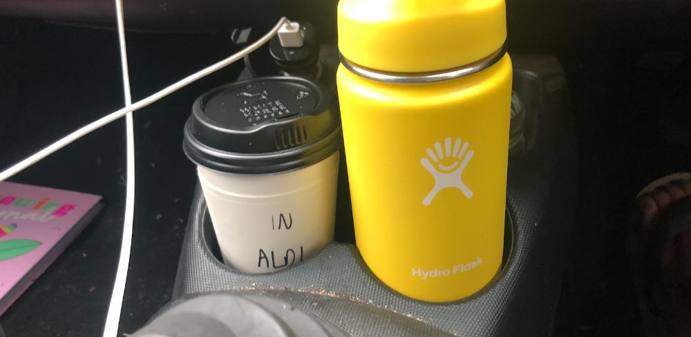 A large car cup holder, because this'll safely keep your Hydro Flask,  thermos, or other bigger bottles on-hand while driving. The days of  listening to your ther…