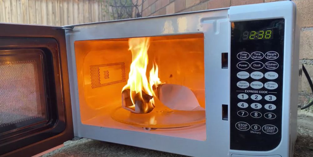 microwave-set-paper-plates-on-fire-large-flames - Hunting Waterfalls