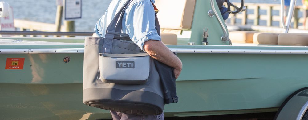 https://huntingwaterfalls.com/wp-content/uploads/2020/10/yeti-sidekick-dry-on-yeti-m30-boat.jpg