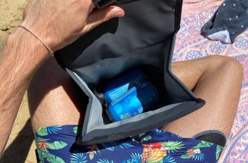 https://huntingwaterfalls.com/wp-content/uploads/2021/02/yeti-daytrip-cooler-bag-lunch-box-at-beach-packing-it-with-beer-open-inside.jpg