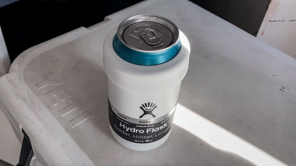 https://huntingwaterfalls.com/wp-content/uploads/2021/04/hydro-flask-cooler-can-on-yeti-cooler-with-beer.jpg