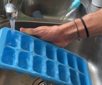 Filling Ice Cube Tray From Tap in Sink