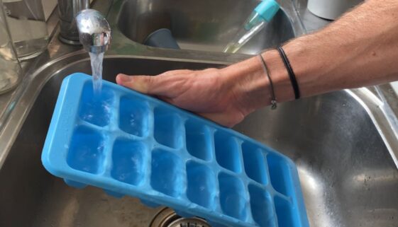 Filling Ice Cube Tray From Tap in Sink