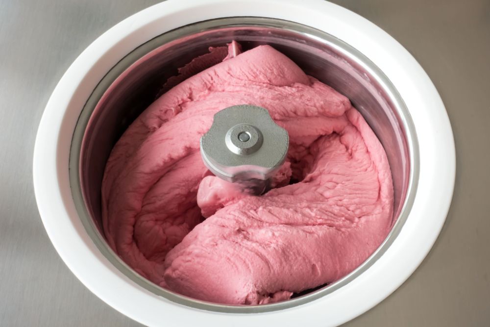 https://huntingwaterfalls.com/wp-content/uploads/2022/08/churning-ice-cream-home-made-maker-berry.jpg