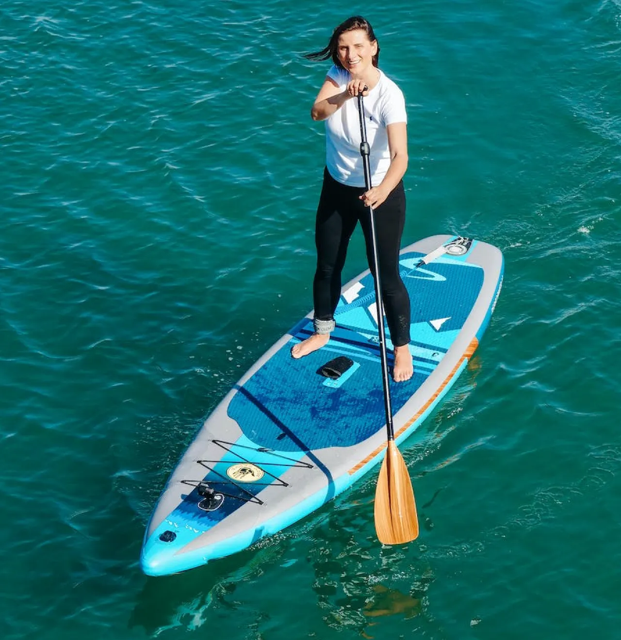 stand-up-paddle-board-sup-woman-paddling-looking-at-camera - Hunting ...