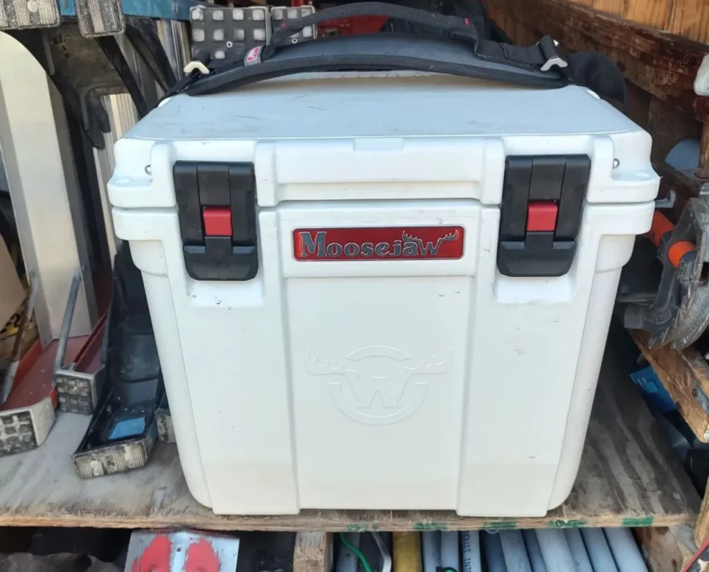 https://huntingwaterfalls.com/wp-content/uploads/2023/08/moosejaw-coolers-25-quart-on-bench-1024x826.webp